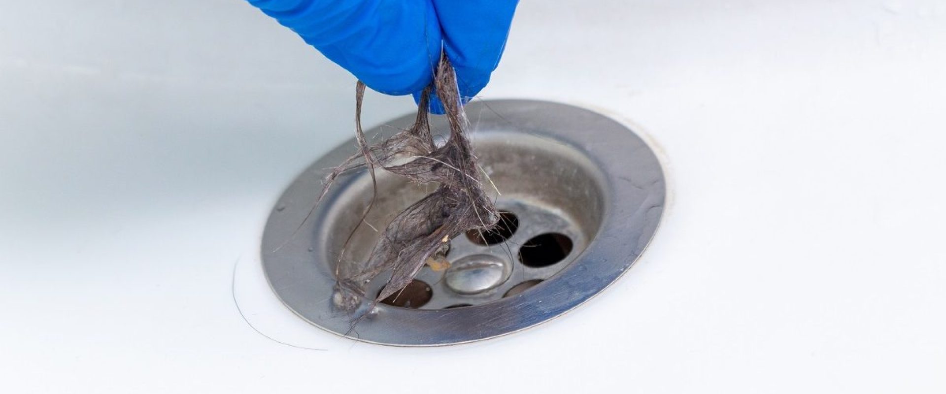 Water not flowing freely needing professional drain cleaning service